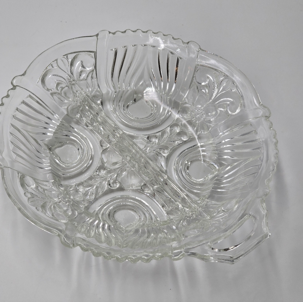 Clear glass divided relish dish in the Indiana Glass Killarney pattern.